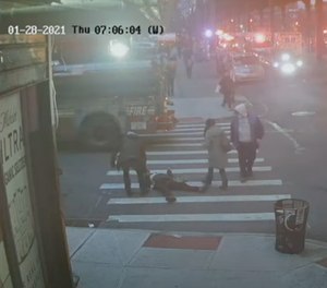 This screenshot from surveillance footage released by the Bronx District Attorney's Office shows Aaron Cervantes-Mejia lying in a crosswalk near a fire scene on Jan. 28, 2021. Cervantes-Mejia was accused of sexually assaulting an FDNY EMT who came to help him; Bronx District Attorney Darcel D. Clark said he appeared to be having a legitimate medical emergency.