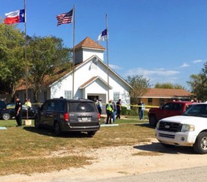 Emergency personnel respond to a fatal shooting at a Baptist church in Sutherland Springs, Texas, Sunday, Nov. 5, 2017.