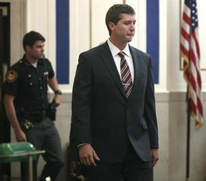 Ray Tensing enters Judge Megan Shanahan's courtroom for his pre-trial hearing on Friday, Oct. 14, 2016, in Cincinnati.