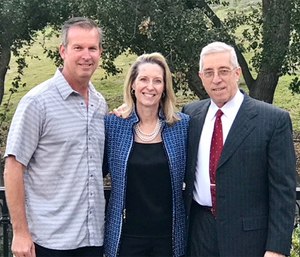 Capt. John Meffert with Frank and Janan Pisano.
