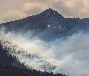 In this July 5, 2017, file photo, a wildfire burns near Breckenridge, Colo. (Photo/AP)