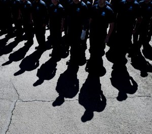 Cadets stand at attention during the Colorado Law Enforcement Memorial ceremony at the Colorado State Patrol Academy in Golden, Colo. (Photo/TNS)