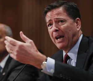 In this Sept. 27, 2016 file photo, FBI Director James Comey testifies on Capitol Hill in Washington.