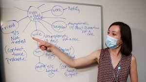 A woman teaches new contact tracers at the Salt Lake City Health Department. Image: AP photo/Rick Bowmer
