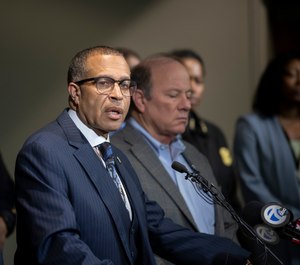 Detroit Police Chief James Craig, left, speaks to the media about two officers who were shot Wednesday evening while responding to a home invasion on Detroit's west side. (Photo/AP)