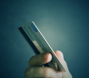 An Ohio firefighter has pleaded guilty to using a firefighter association's credit card to make purchases while on a vacation trip to Disney World.