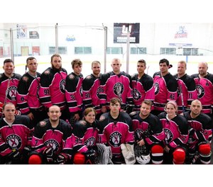 The Cromwell Fire Hockey team wore pink jerseys at its last game in October to help raise money for the Middlesex Health Cancer Center. The team is made up of full-time, part-time and volunteer firefighters, EMS personnel and dispatchers, as well as some of their family and friends. (Photo/Cromwell Fire Hockey Facebook)