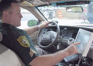 Police officers run the risk of being more distracted than most. (File Photo)