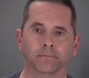 Ryan Cushing-Gomez, a former firefighter, was charged with falsely impersonating an officer after reportedly panhandling while wearing a Pasco County firefighter's shirt and hat.