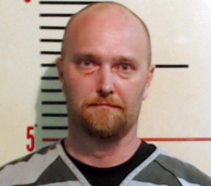 This file booking photo provided by the Parker County Sheriff's Office shows Roy Oliver.