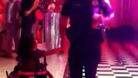 Video: Officer dances with young girl in wheelchair at party