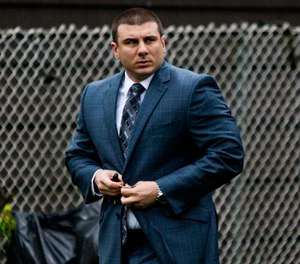 In this May 13, 2019, file photo, New York City police officer Daniel Pantaleo leaves his house in Staten Island, N.Y. (AP Photo/Eduardo Munoz Alvarez, File)