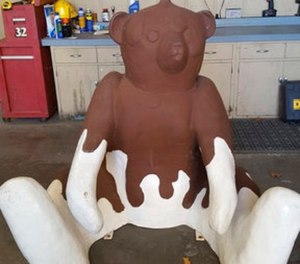 This Dec. 13, 2017 photo provided by the Abilene, Kan., Police Department shows a bear statue at the department that was stolen from outside a candy factory in central Kansas a year ago. (Jason Wilkins/Abilene Police Department via AP)