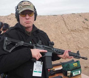 P1 Editor in Chief Doug Wyllie shoots the Daniel Defense M4 Carbine V11 SLW at SHOT Show 2016.