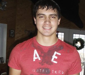 This November 2013 photo provided by Tammy Sadek shows Andrew Sadek at home near Rogers, N.D.