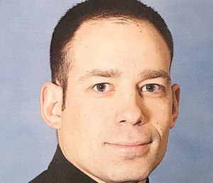 Deputy Jon Vosburgh saved a young special needs girl from drowning in Lake Ontario.