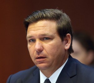 Florida Gov. Ron DeSantis listens to the proceedings during a Florida cabinet meeting Tuesday June 4, 2019, in Tallahassee, Fla. (AP Photo/Steve Cannon)