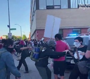 Several protester in Des Moines attacked police officers with bricks and rocks, escalating what was once a peaceful protest. (Photo/TNS)