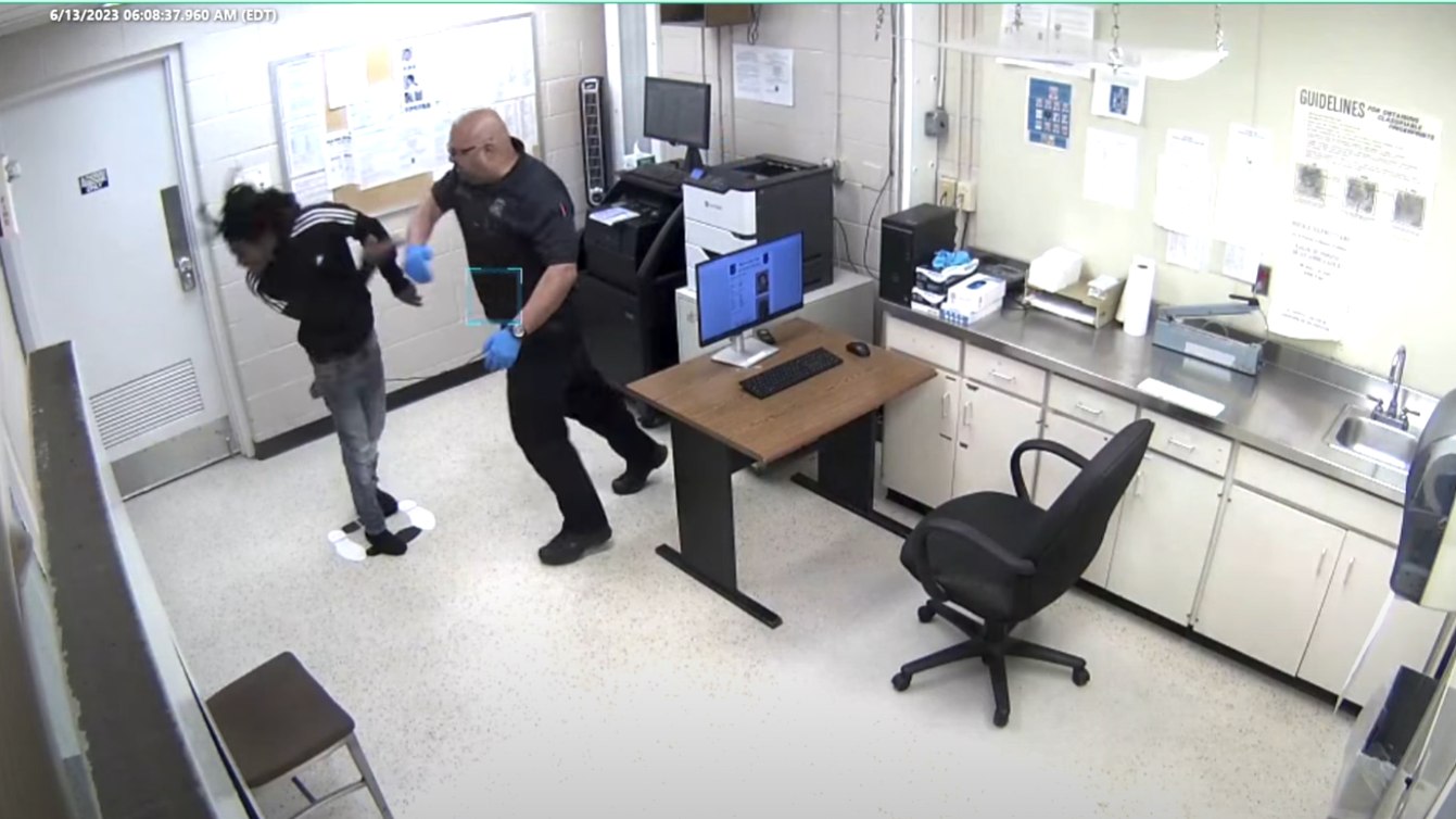 Mich officer charged with assault after video shows him punching man Mich officer charged with assault after video shows him punching man