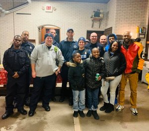 Detroit first responders worked together with the Detroit Public Safety Foundation to collect donations for two sisters, Lavaeha and Kissiah Edwards, and their father Cameron Edwards after the girls' mother died from an overdose last week. (Photo/Detroit Public Safety Foundation Facebook)