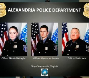 A poster shows images of Alexandria, Va. Police Officers, from left, Nicole Battaglia, Alexander Jensen, and Kevin Jobe, during a news conference at the Police Headquarters in Alexandria, Va., Monday, June 19, 2017, about the June 14 shooting at a baseball field in Alexandria. (AP Photo/Jacquelyn Martin)