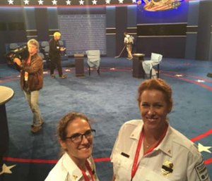 Sabina Braithwaite, MD Deputy Chief of Washington University EMS, and Maia Dorsett, MD 2016 Fellow in EMS Medicine, in the debate hall.