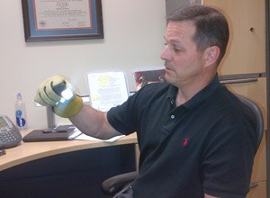 Greg Price, S&T’s First Responders Group program manager, demonstrates the new glove.