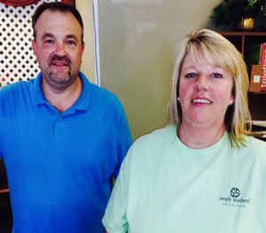 Todd Frady, left, and Debbie Dills of Frady's Florist in Kings Mountain, N.C., pose for a photo Thursday, June 18, 2015.