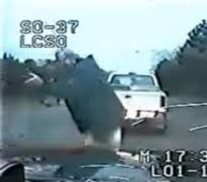 This still image taken from a dash cam shows Andrew Brannan firing at Deputy Kyle Dinkheller.
