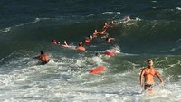 Rescue crew forms human chain to save man from ocean