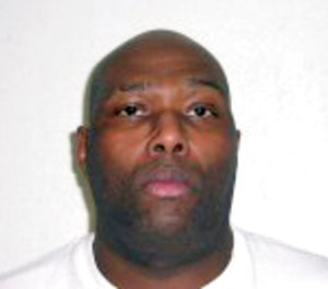 This undated file handout photo provided by the Arkansas Department of Correction shows Stacey Johnson. (Arkansas Department of Correction via AP, File)