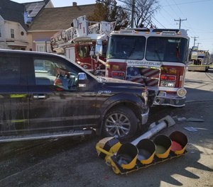 The City of Manchester Fire Department's Ladder 1 and Engine 11 were involved in a three-vehicle crash with a pickup truck on Friday, sending eight firefighters and one civilian to the hospital. Officials say both apparatus were severely damaged and replacing them could cost more than $1.5 million. (Photo/Manchester NH Police Twitter)