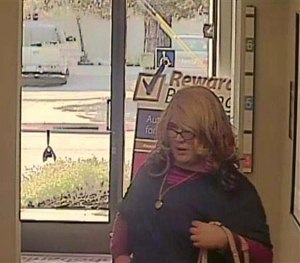 This Friday, April 3, 2015, image from surveillance video shows a wanted man dubbed the "Mrs. Doubtfire" bandit. (AP Image)