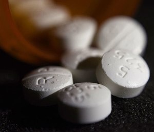 Washington State is tightening rules on opioid prescriptions in an effort to prevent fatal overdoses. (Photo/AP)