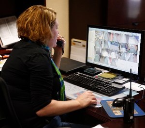 In this May 6, 2016, photo, Forest Dale Elementary School administrative assistant Heather Fellabaum tracks an 