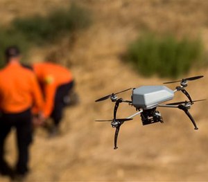 The UAV has been spotted almost every single day, hovering above area shops, local parks, and other places. (AP Image)