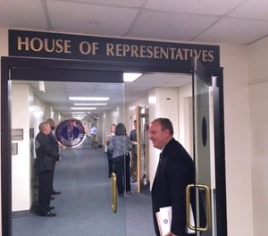 Kentucky Republican state Rep. Jason Nemes walks into a private meeting of the state House of Representatives on Tuesday, Aug. 29, 2017 in Frankfort, Ky. (AP Photo/Adam Beam)