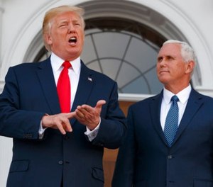 President Donald Trump, accompanied by Vice President Mike Pence, speaks to reporters before a security briefing at Trump National Golf Club in Bedminster, N.J., Thursday, August 10, 2017, (AP Photo/Evan Vucci)