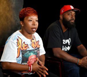 In this Sept. 27, 2014, file photo, the parents of Michael Brown, Lezley McSpadden, left, and Michael Brown Sr., sit for an interview with The Associated Press in Washington.