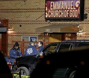 New York City Police Department Crime Scene investigators survey the scene of a shooting outside Emmanuel Church of God in Brooklyn.