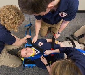 EMS students participate in a training session at Willamette University. The college's student-run Willamette EMS takes real emergency calls from campus at no cost to student patients.