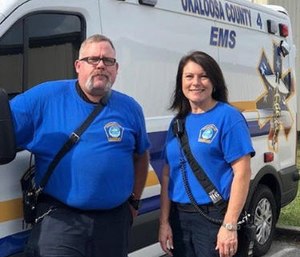 Kris Kempf and Karen Griffin rebuilt a wheelchair ramp for a patient after his wheelchair slid off of it. (Photo/OCEMS)