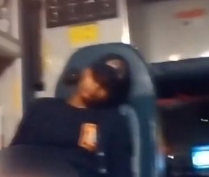 A screenshot of the video purporting to show the EMT asleep while transporting a patient to the hospital.