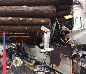 A field amputation was necessary to remove the drive of a semi after a collision with a log hauler on a remote stretch of I-90 in north Idaho.