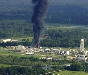 Nearly 20 residents say test results have detected toxic substances in soil, water and ash samples taken miles from the chemical plant explosion. (Photo/AP)