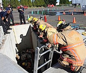 Establishing safe working areas will minimize the potential for responders falling over a drop off. (Photo/City of Portland, Ore.)