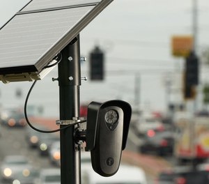 The solar-powered cameras from Flock Group are optimized to shoot the rear of passing vehicles and capture the make, model, color, license plate and state that issued the plate.
