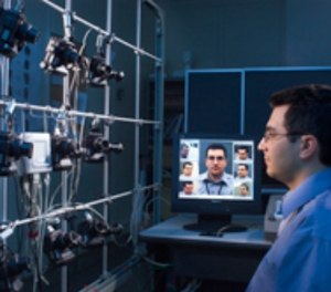 NIST computer scientist Ross Micheals demonstrates a NIST-developed system for studying the performance of facial recognition software programs.