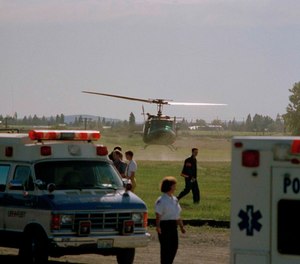 A helicopter carrying a shooting victim takes off from Fairchild Air Force Base in Spokane, Wash., June 20, 1994.
