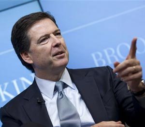FBI Director James Comey speaks about the impact of technology on law enforcement, Thursday, Oct. 16, 2014, at Brookings Institution in Washington.